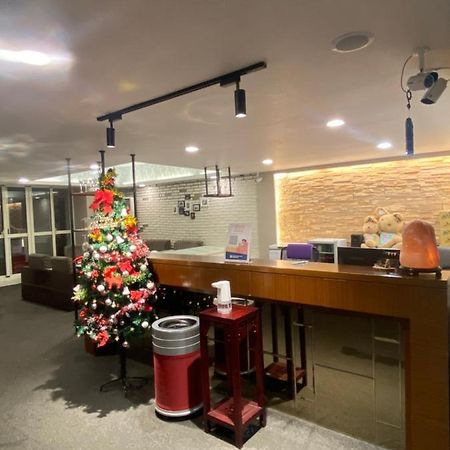 Aiyue Hotel Huwei Esterno foto