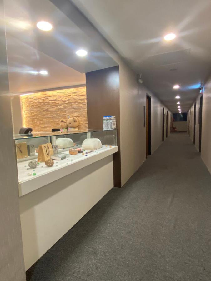 Aiyue Hotel Huwei Esterno foto