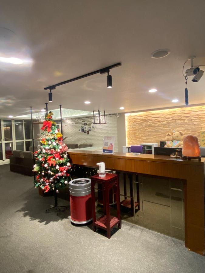 Aiyue Hotel Huwei Esterno foto